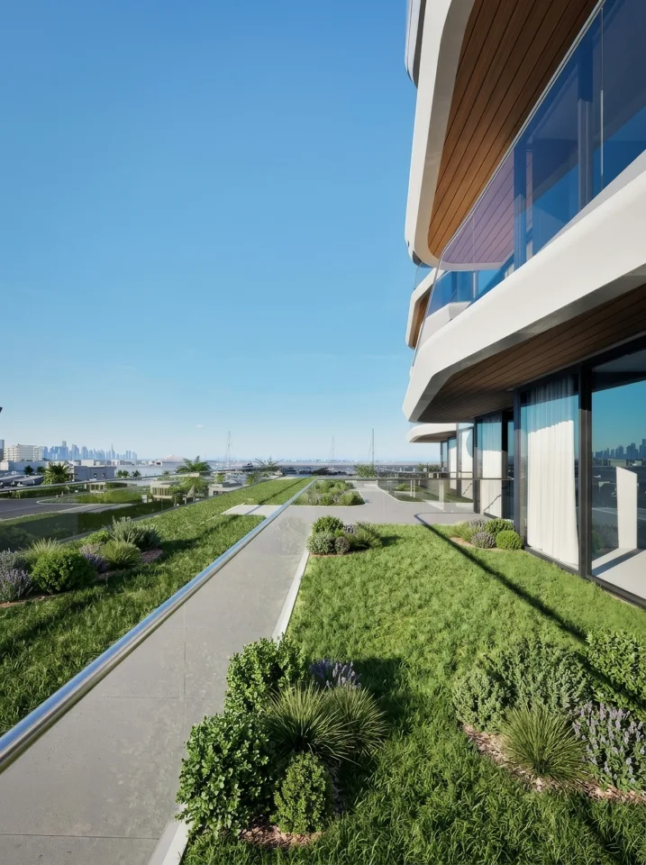Curved balconies and planted terraces of Blue Marina Residence